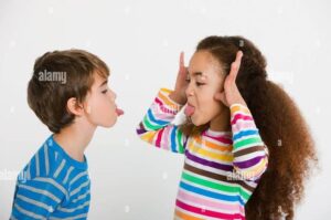 Making faces at each other