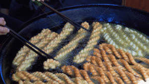 frying-the-Fried-dough-twists-Ma-Hua